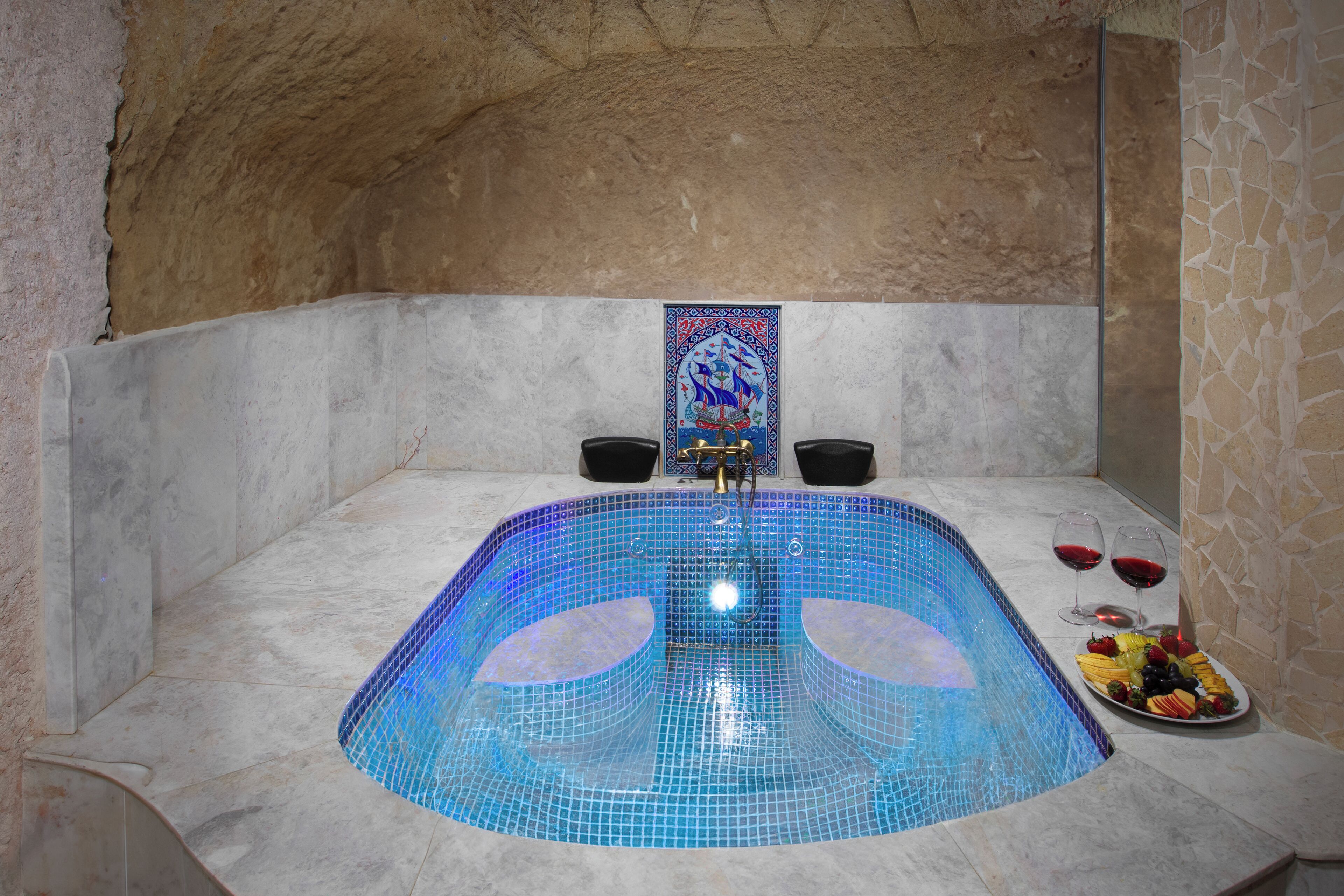 uzengi cave  family suite with pool room | bathroom | free toiletries, hair dryer, slippers, towels