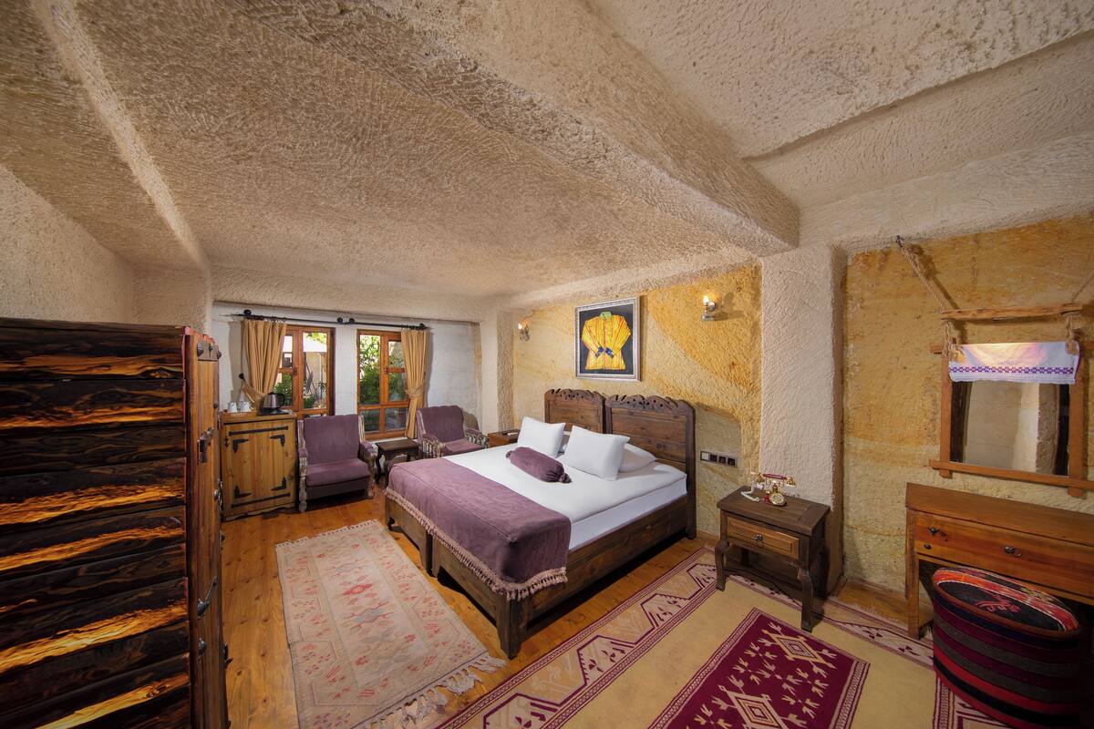 Tokali Deluxe Family Cave Room | Ropa de cama de alta calidad, edredón y minibar