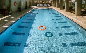 2 outdoor pools, open 8:00 AM to 11:00 PM, pool umbrellas, pool loungers