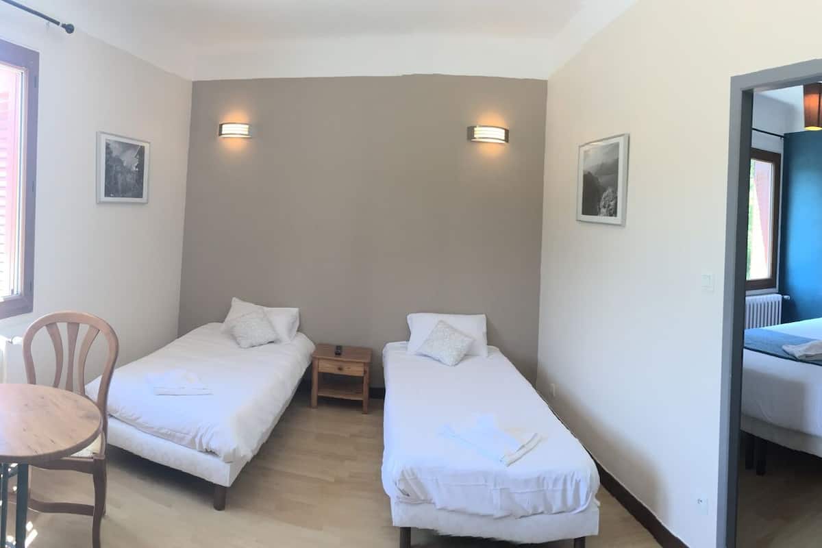 1 bedroom, premium bedding, laptop workspace, iron/ironing board
