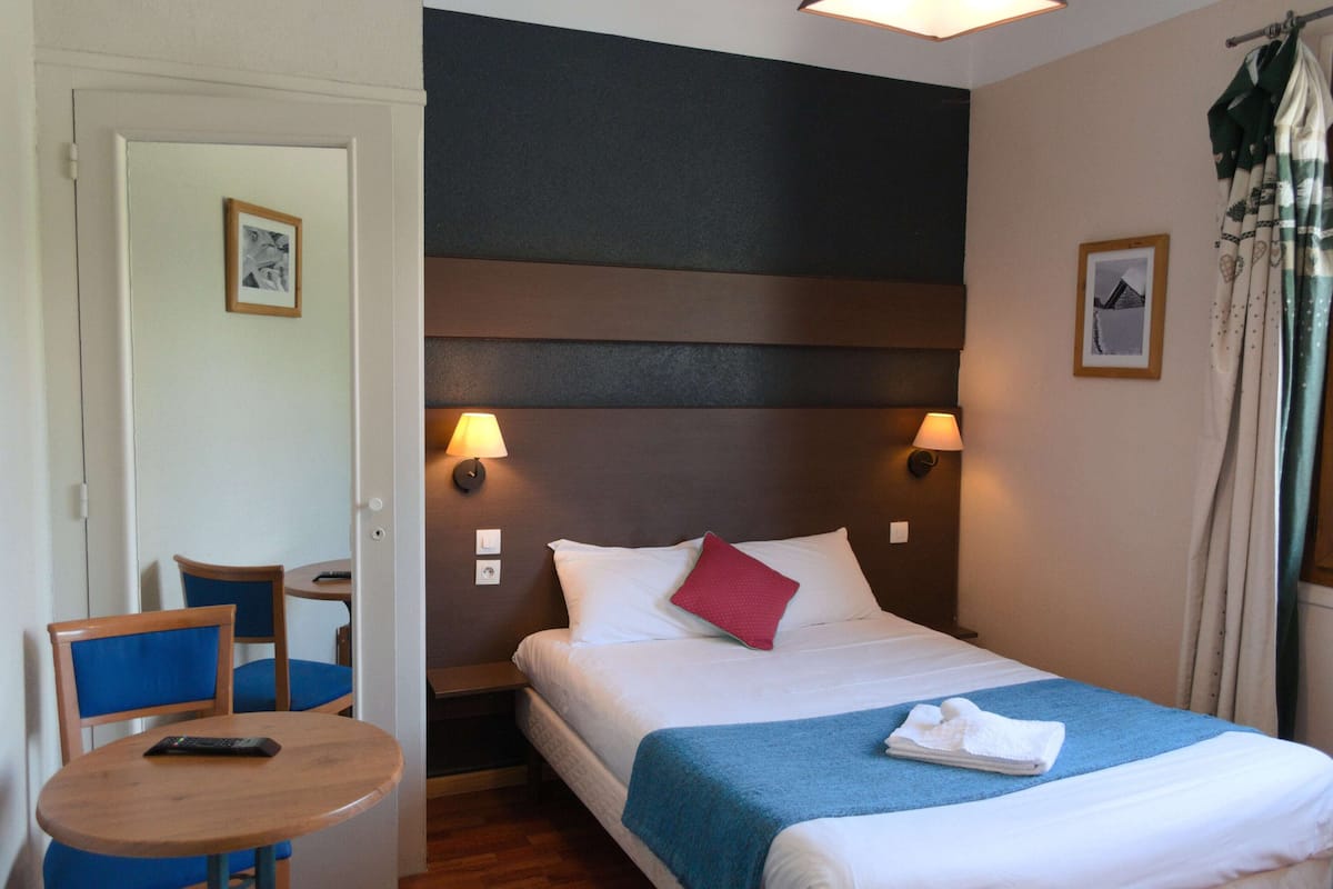 1 bedroom, premium bedding, laptop workspace, iron/ironing board