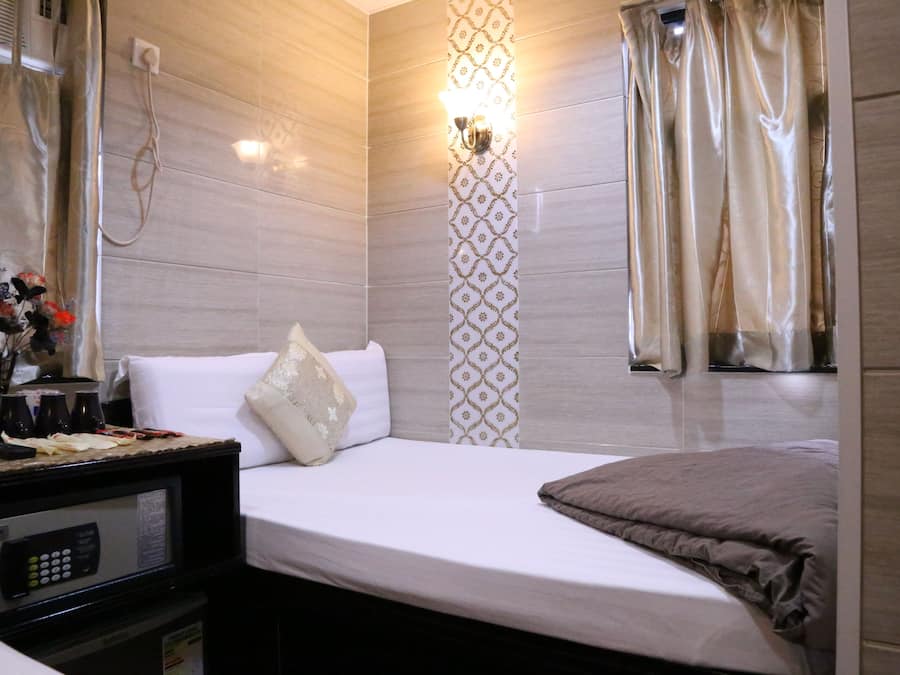 Cofres nos quartos, ferros/tábuas de passar roupa, Wi-Fi de cortesia