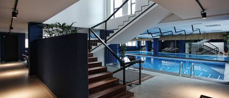 Indoor pool, open 7:00 AM to midnight, pool umbrellas, pool loungers