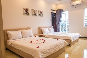 Deluxe Room, Balcony | Minibar, desk, free WiFi, bed sheets - Maika Hotel (Nha Trang)