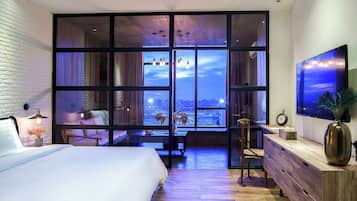 Studiosuite, 1 King-Bett (Sunset) | Minibar, Zimmersafe, individuell eingerichtet, Schreibtisch