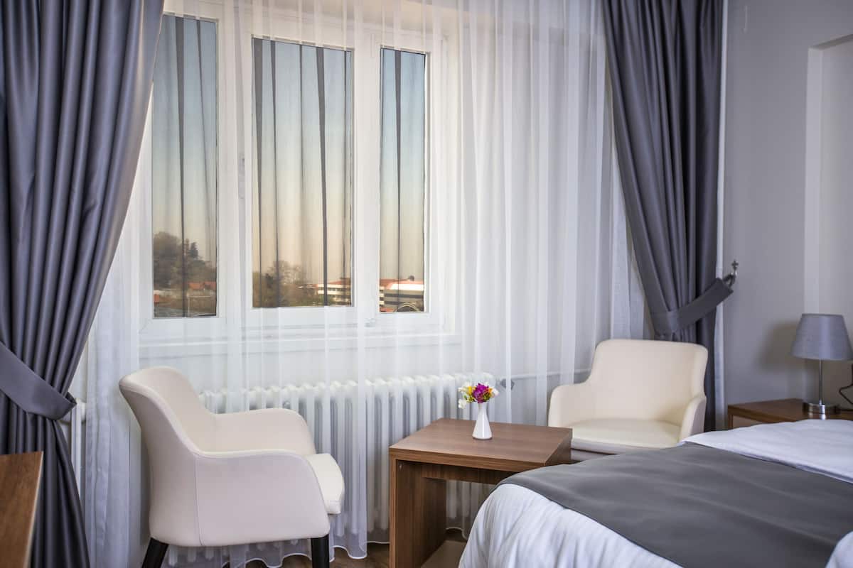 family suite | 1 bedroom, in-room safe, desk, laptop workspace