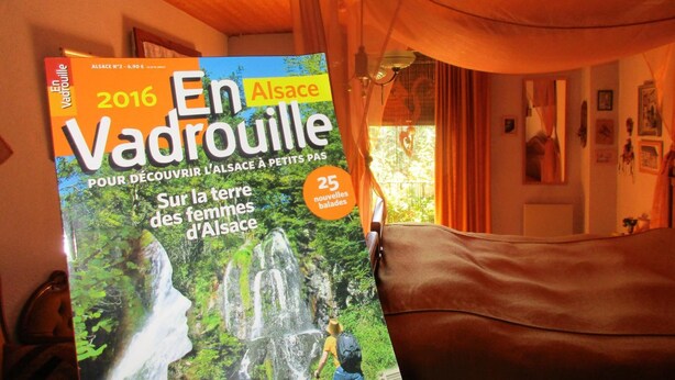 A magazine titled 'En Vadrouille 2016' with a cover featuring a waterfall and a person hiking. - Tilly's B&B (Le Hohwald)