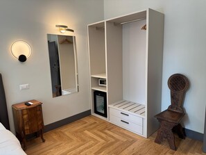 Chambre Standard double ou avec lits jumeaux | Literie de qualité, minibar, coffre-fort, décor unique