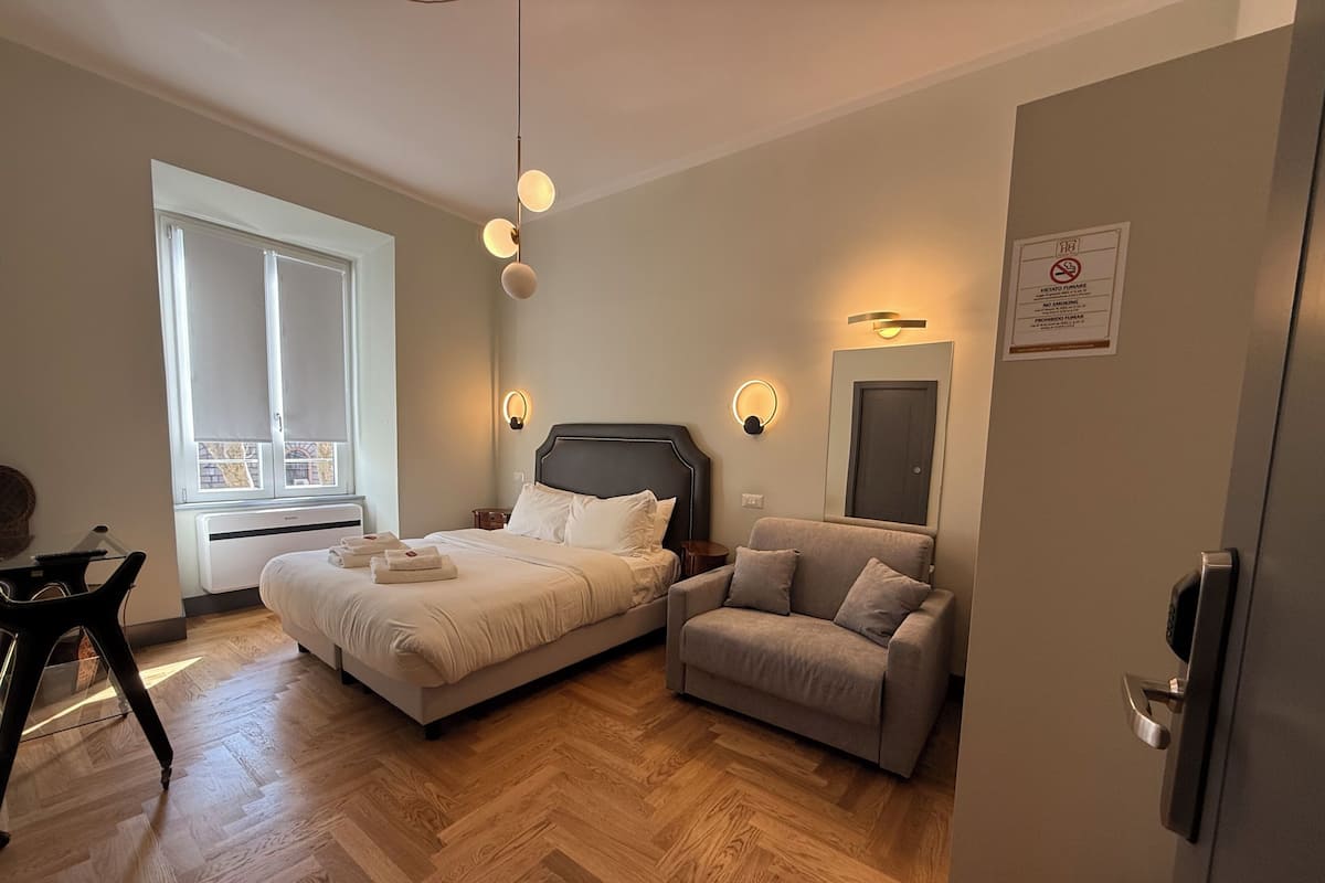 Habitación triple estándar | Ropa de cama de alta calidad y minibar