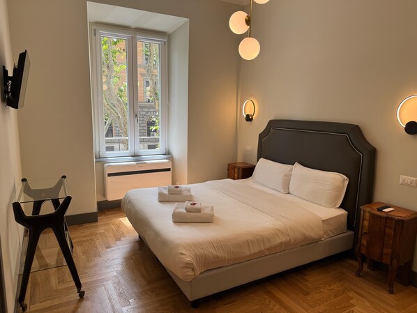 Chambre Standard double ou avec lits jumeaux | Literie de qualité, minibar, coffre-fort, décor unique