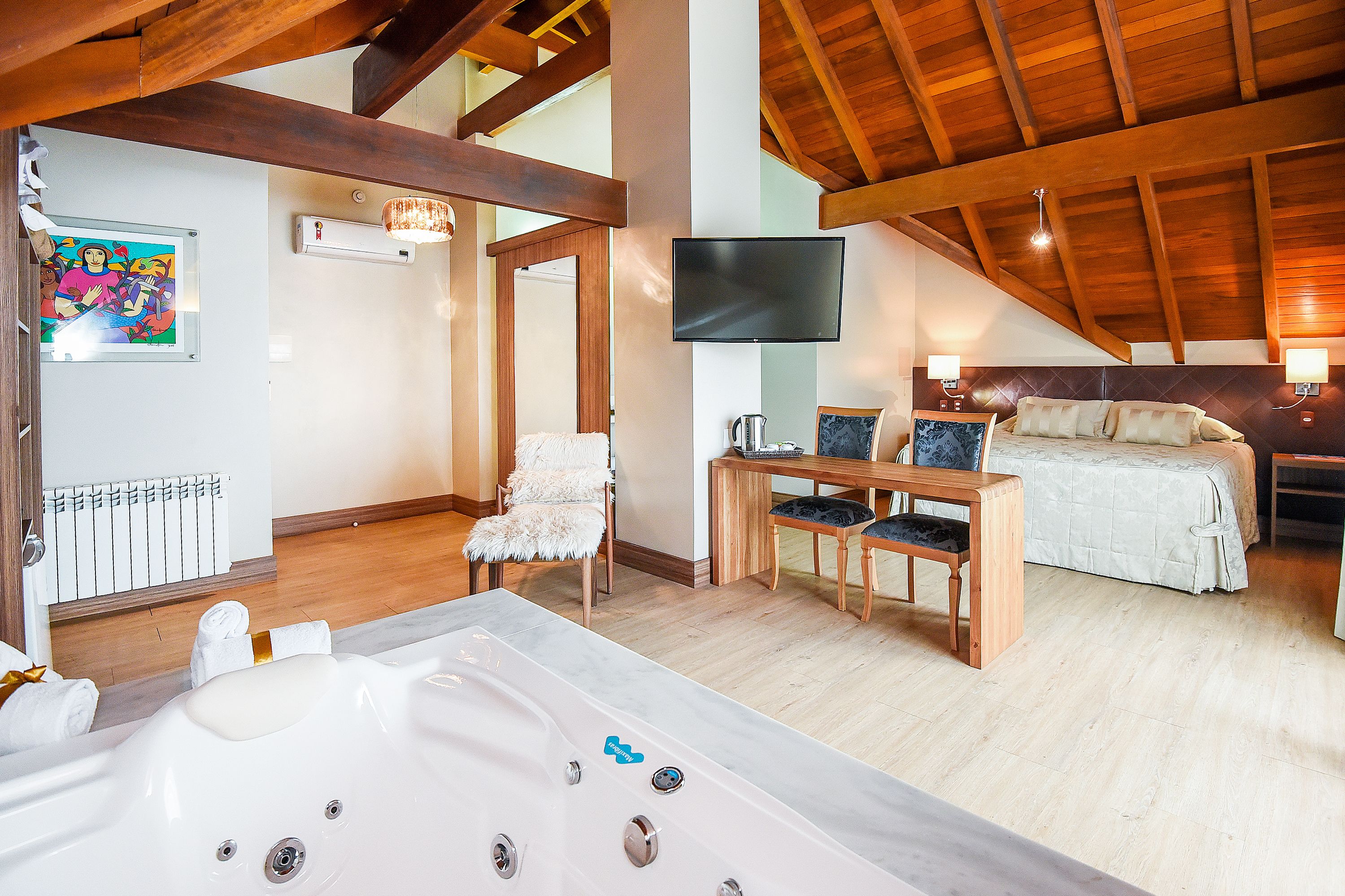 Luxury Suite, Jetted Tub | Premium bedding, minibar, in-room safe, desk