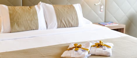 Ropa de cama de alta calidad y minibar 