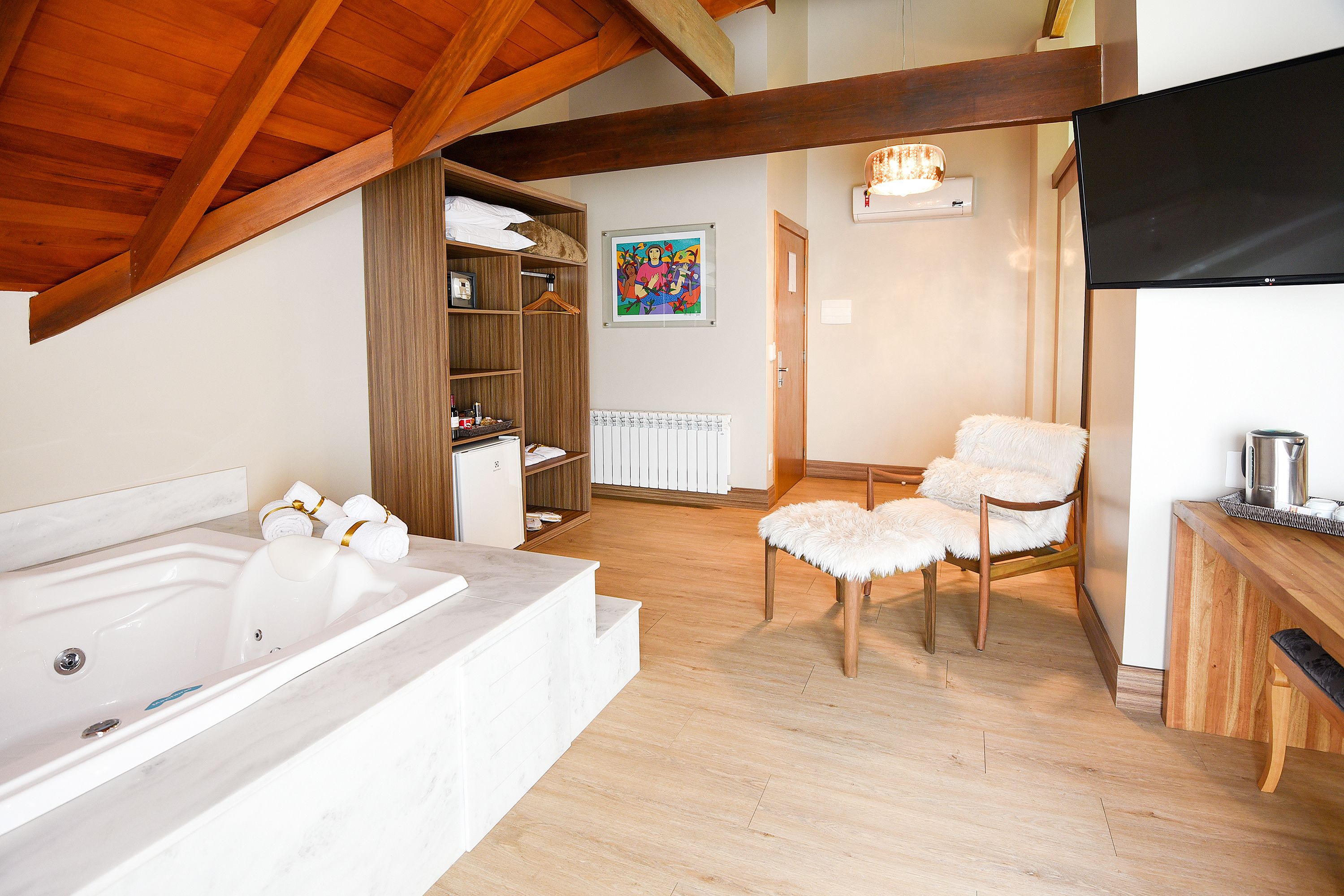 luxury suite, jetted tub | 1 bedroom, premium bedding, minibar, in-room safe