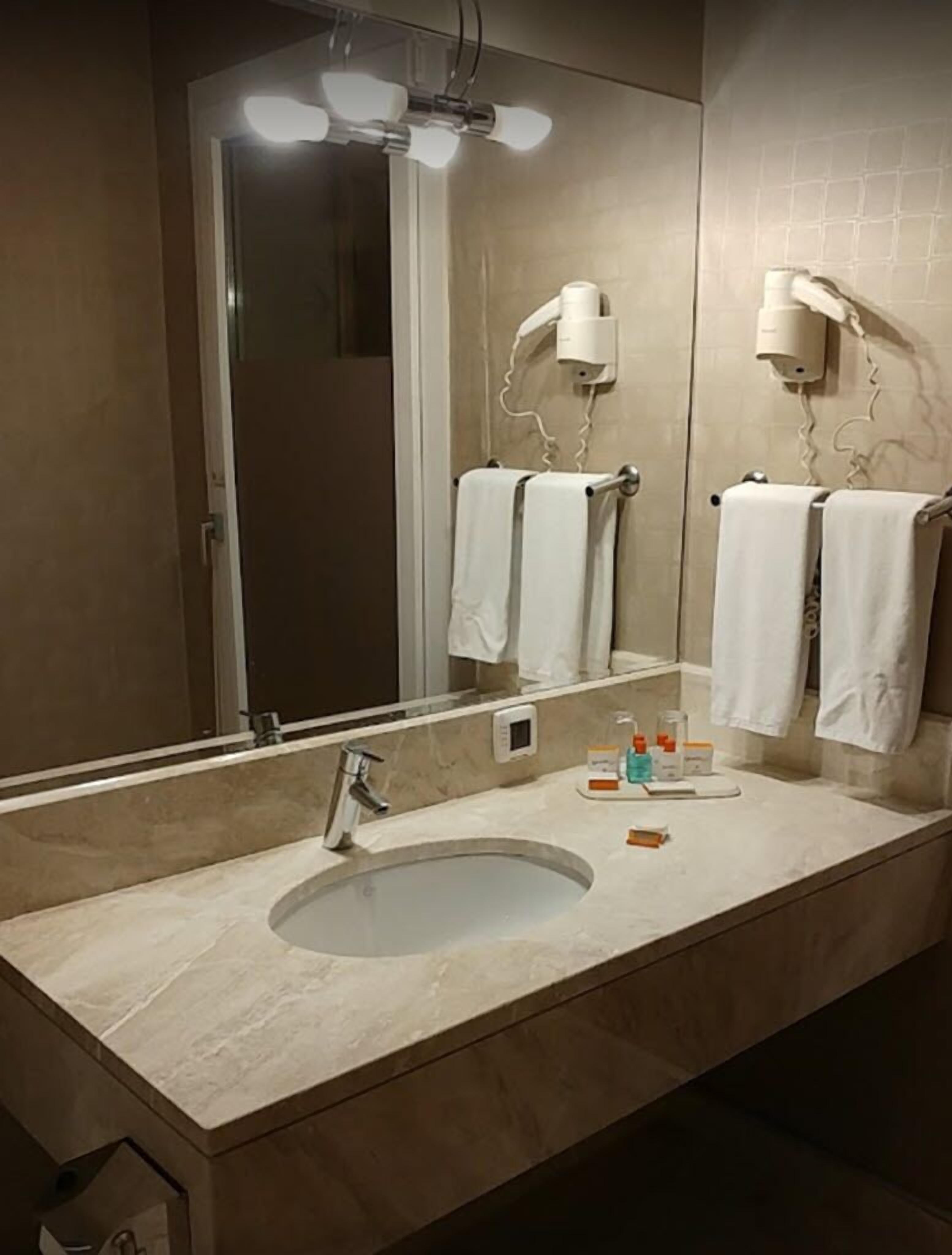 standard double or twin room | bathroom | free toiletries, hair dryer, slippers, towels