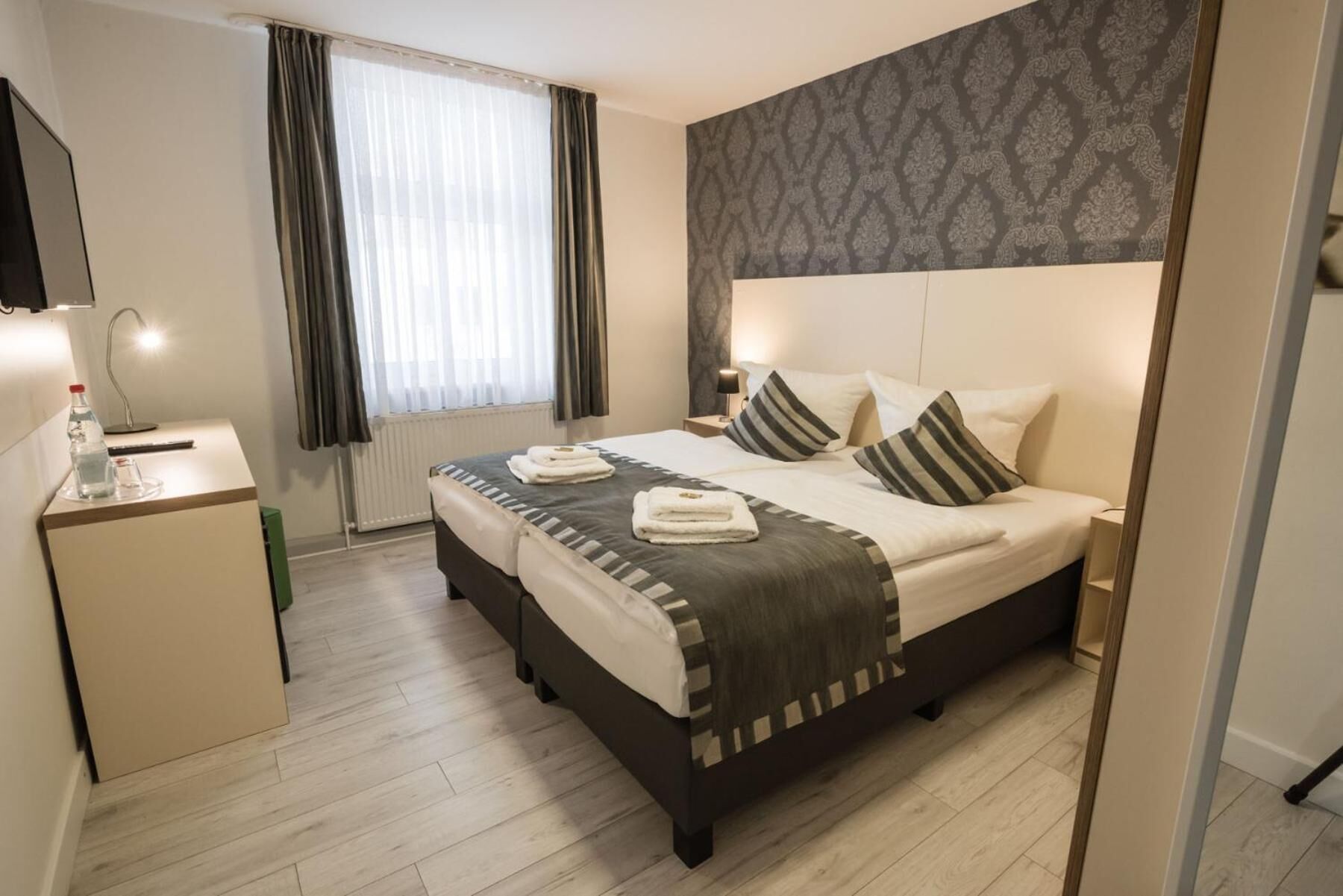 premium bedding, minibar, desk, laptop workspace