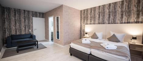 2 habitaciones, ropa de cama de alta calidad, minibar y escritorio