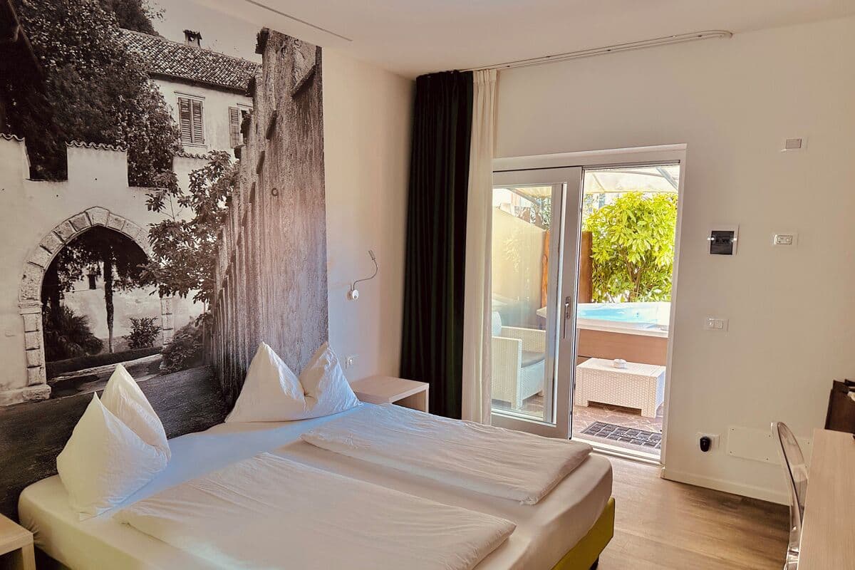 Exklusivt dubbelrum eller tvÄbÀddsrum | SÀngtillbehör av högsta kvalitet, duntÀcken, bÀddmadrasser och minibar