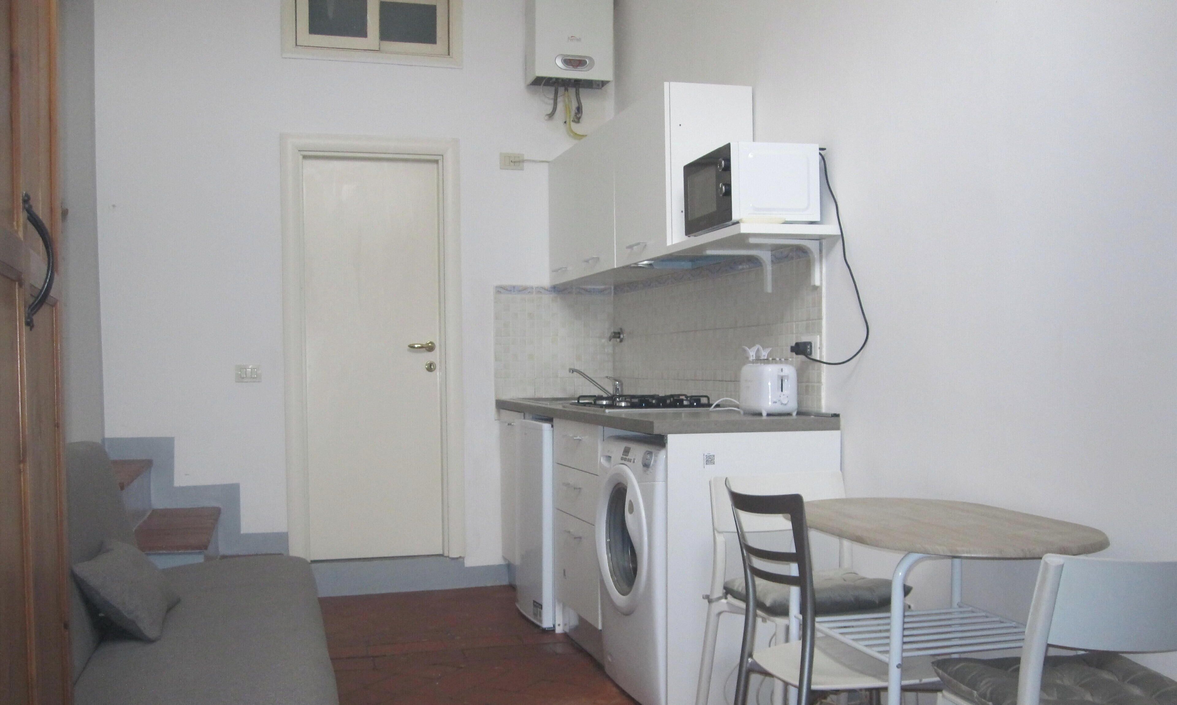 Apartemen | Area keluarga | TV layar datar