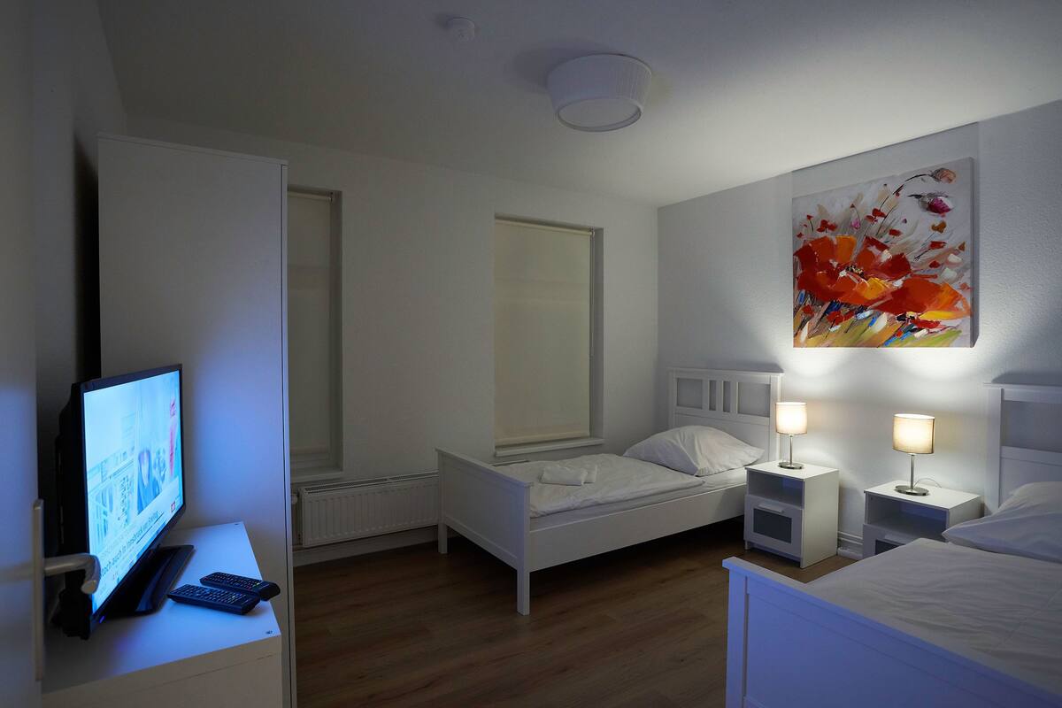 Comfort Apartment, 2 Bedrooms | 1 bedroom, desk, iron/ironing board, cots/infant beds