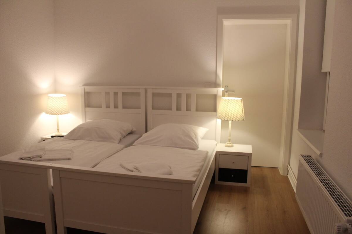 Comfort Apartment, 4 Bedrooms | 1 bedroom, desk, iron/ironing board, cots/infant beds