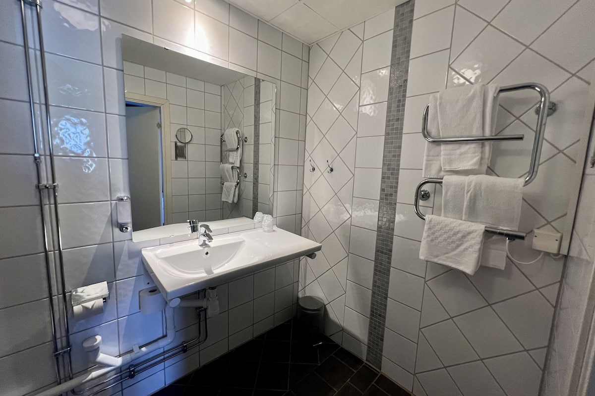 family room | bathroom | shower, hair dryer, towels