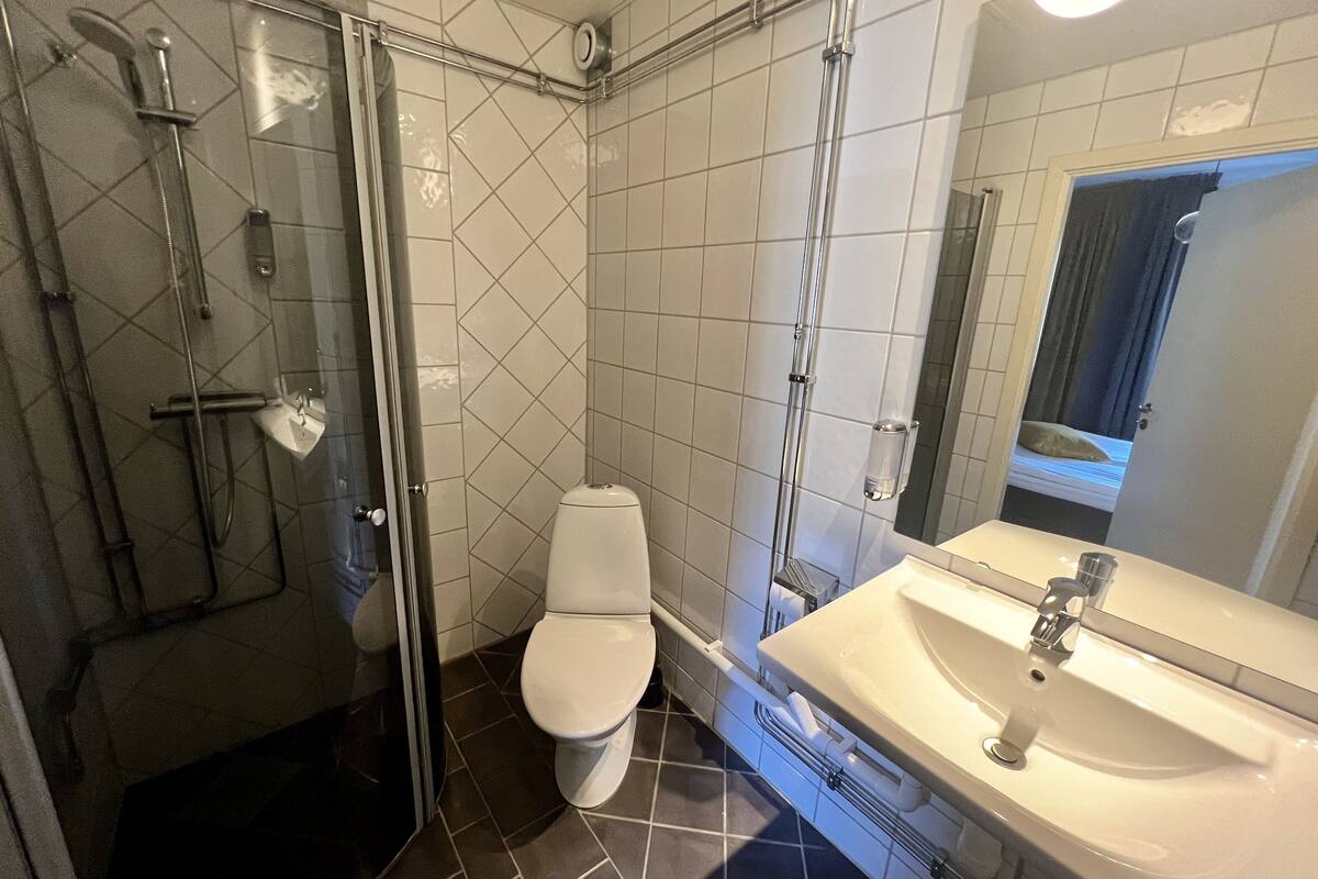 family room | bathroom | shower, hair dryer, towels