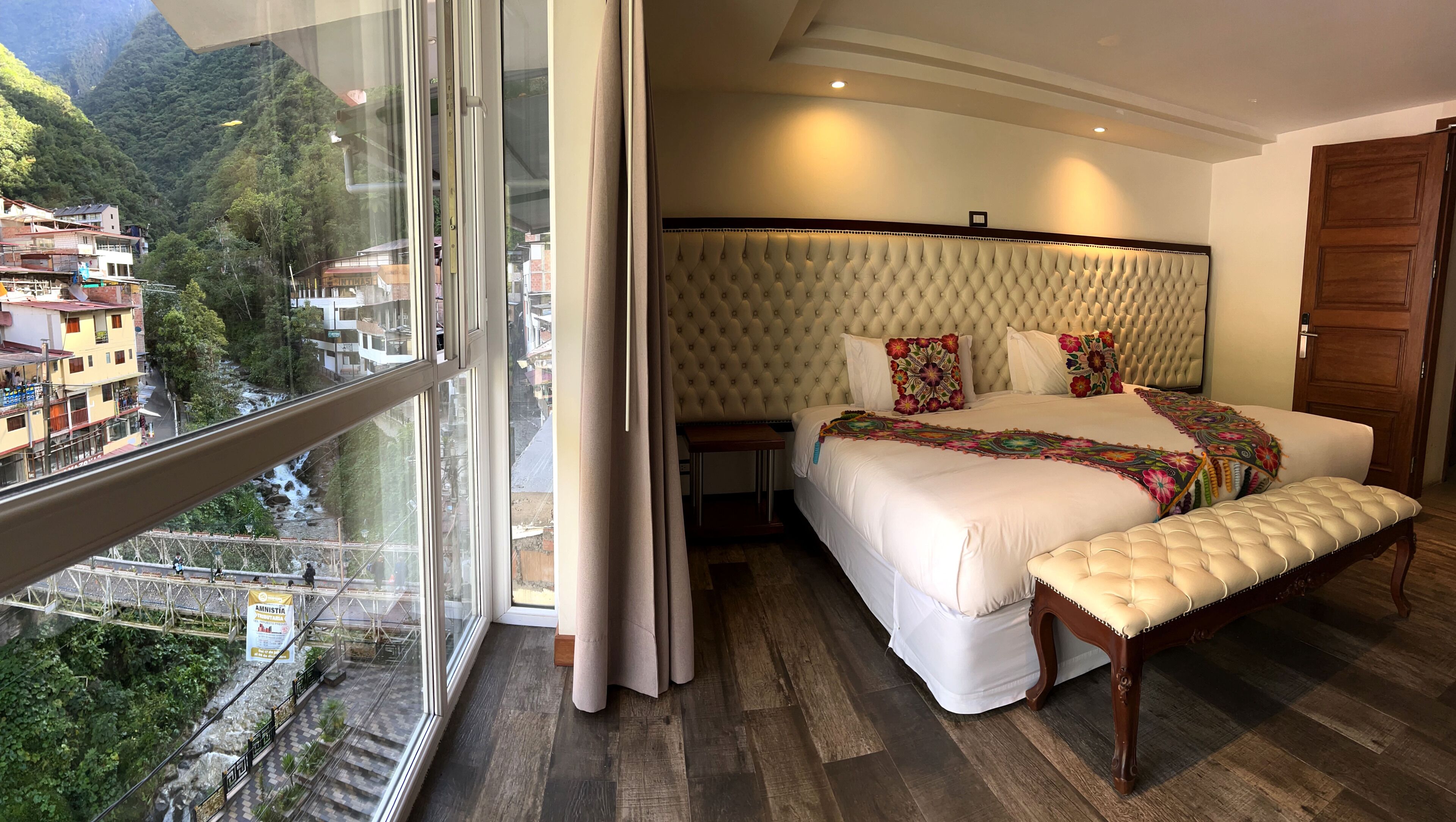 deluxe studio suite, river view (and mountain view) | 1 bedroom, premium bedding, down duvets, minibar