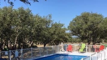 Seasonal outdoor pool, open 6:00 AM to 10:00 PM, sun loungers