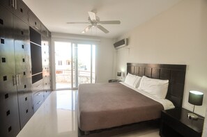 Comfort Apartment, 3 Bedrooms, City View | 3 bedrooms, in-room safe, desk, iron/ironing board