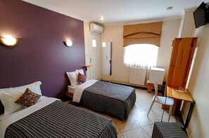 Twin Room | Premium bedding, blackout drapes, iron/ironing board, free WiFi