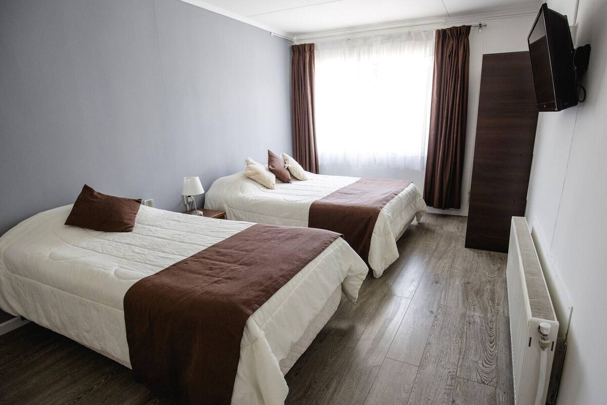 Blackout curtains, iron/ironing board (on request)