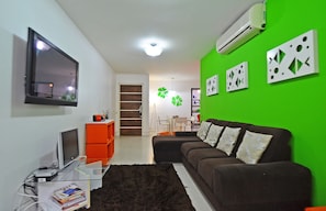 Apartment, 3 Bedrooms | Living area | Flat-screen TV