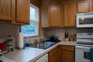 Condo, 2 Bedrooms | Private kitchen | Fridge, microwave, stovetop, dishwasher