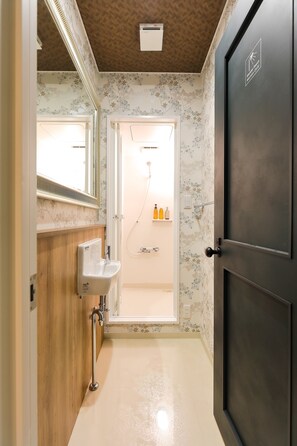 Shared Dormitory, Women only | Bathroom | Shower, free toiletries, hair dryer, slippers