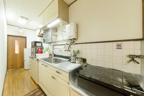 Fridge, microwave, cookware/dishes/utensils