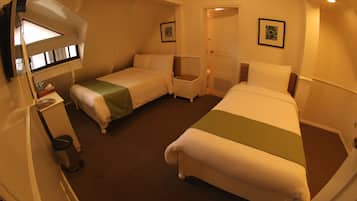 Standard Twin Room | Minibar, in-room safe, individually decorated, individually furnished