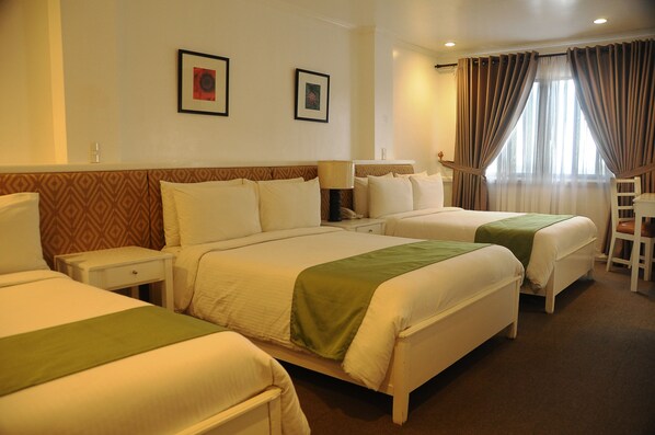 Familienzimmer | Minibar, Zimmersafe, individuell dekoriert, individuell eingerichtet