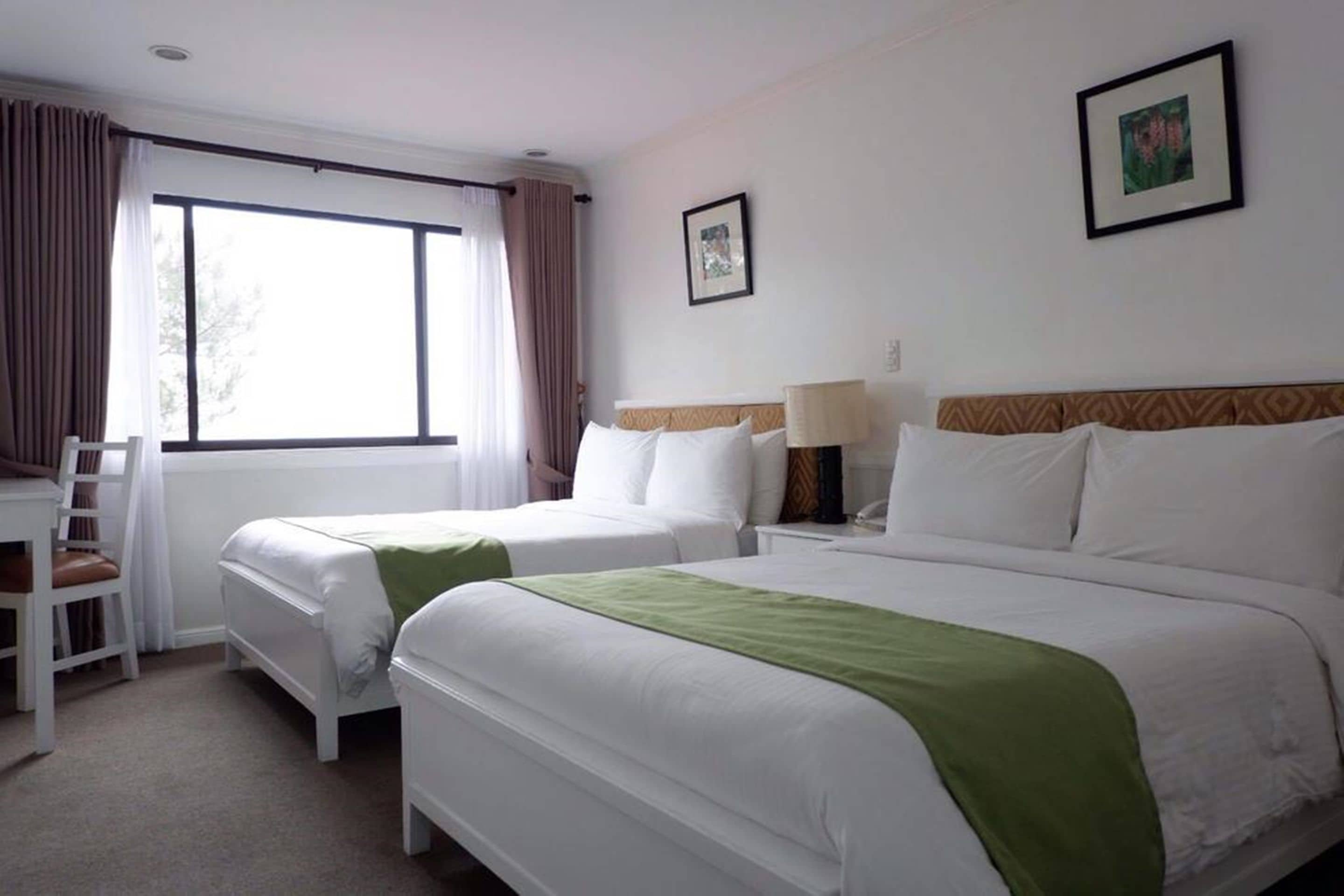 Deluxe Double Room | Minibar, in-room safe, individually decorated, individually furnished