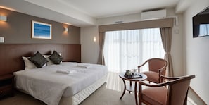 Habitación doble (Hotel Type) | Cortinas opacas, wifi gratis, ropa de cama