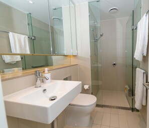 Shower, rainfall showerhead, designer toiletries, hair dryer - Melbourne CBD Victoria Harbour Short Stay Service Apartments (Docklands)