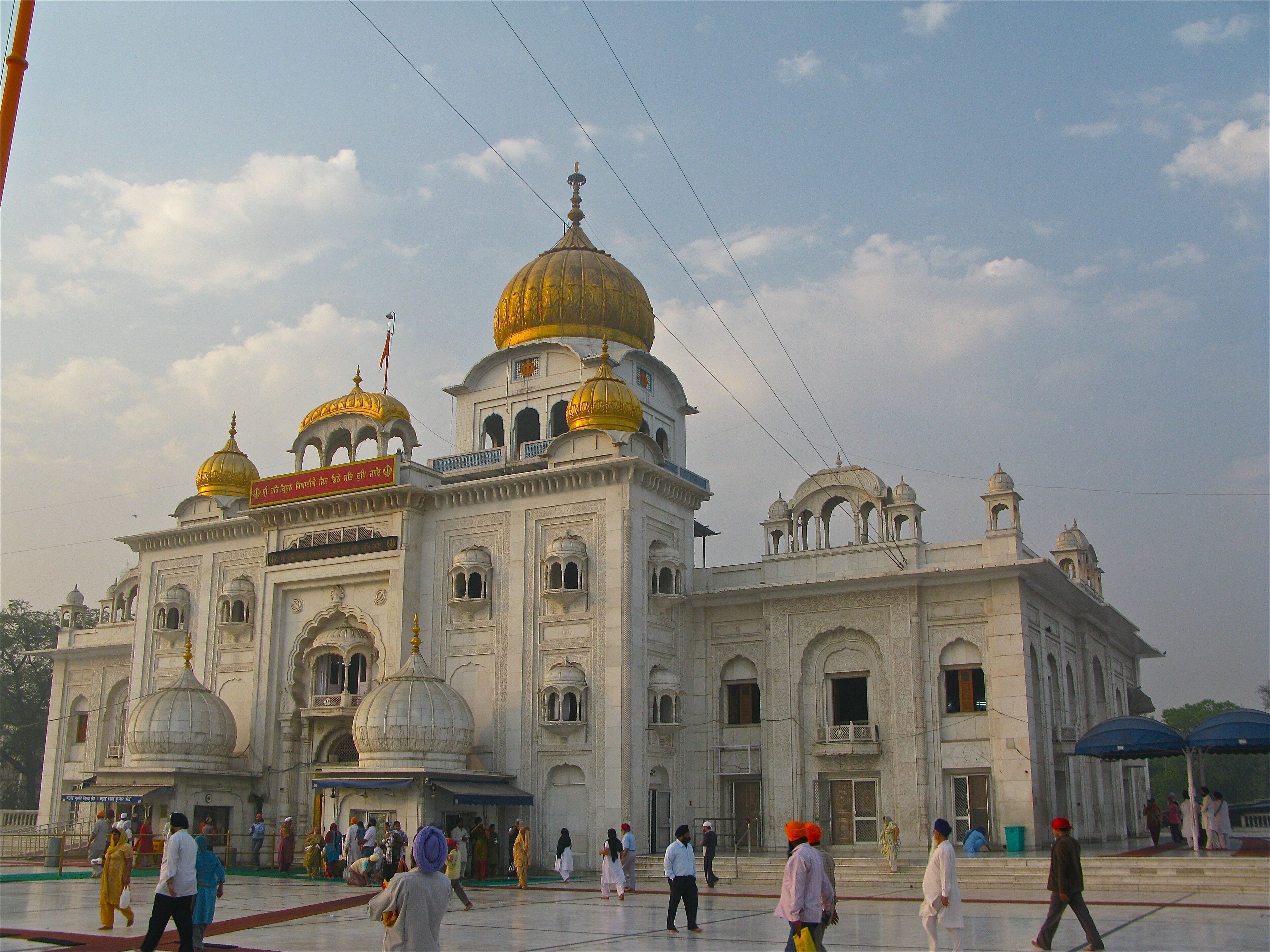 A large, ornate building with multiple domes and arches, likely a historical or religious site.