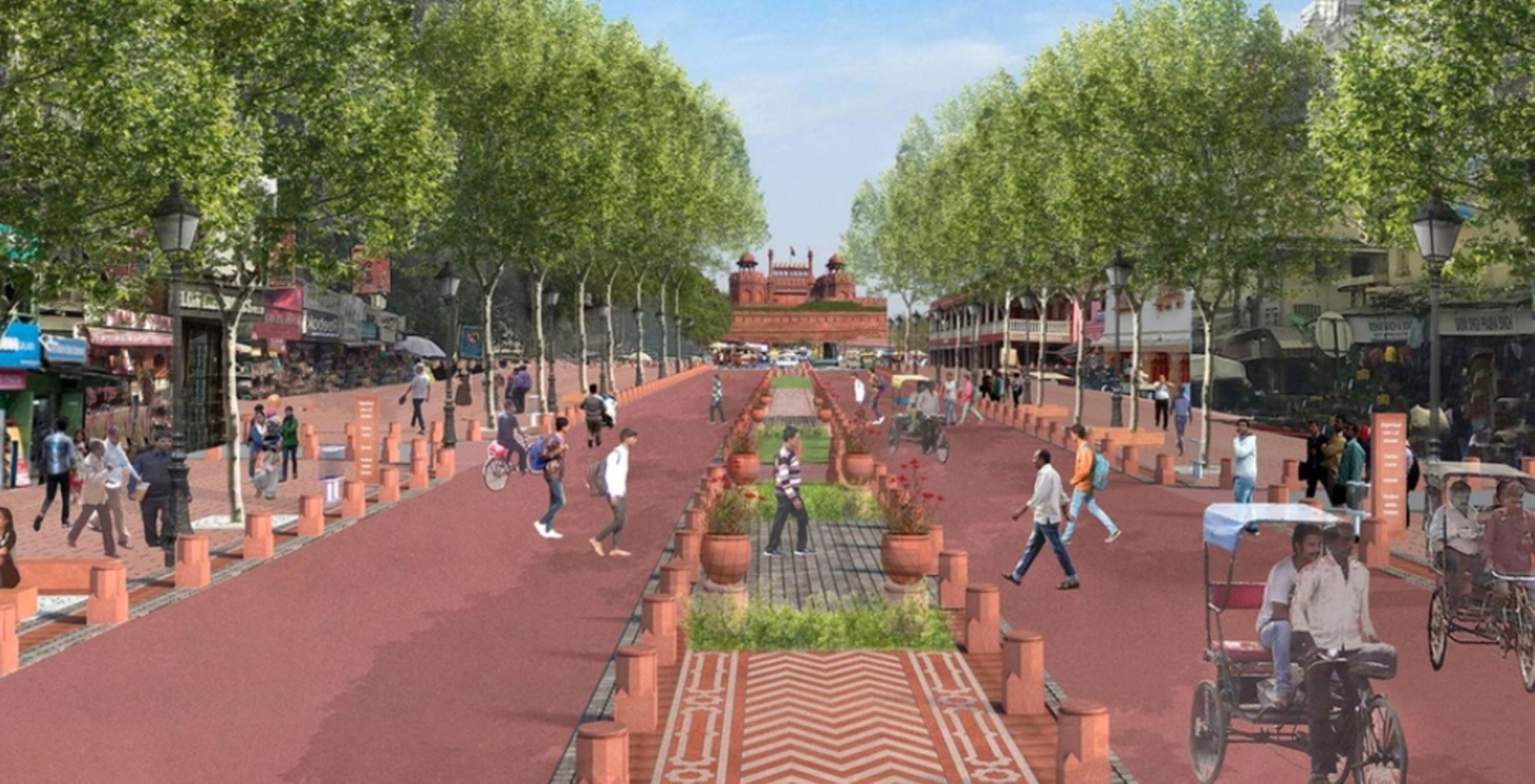 A wide pedestrian street with trees, benches, and a central pathway.