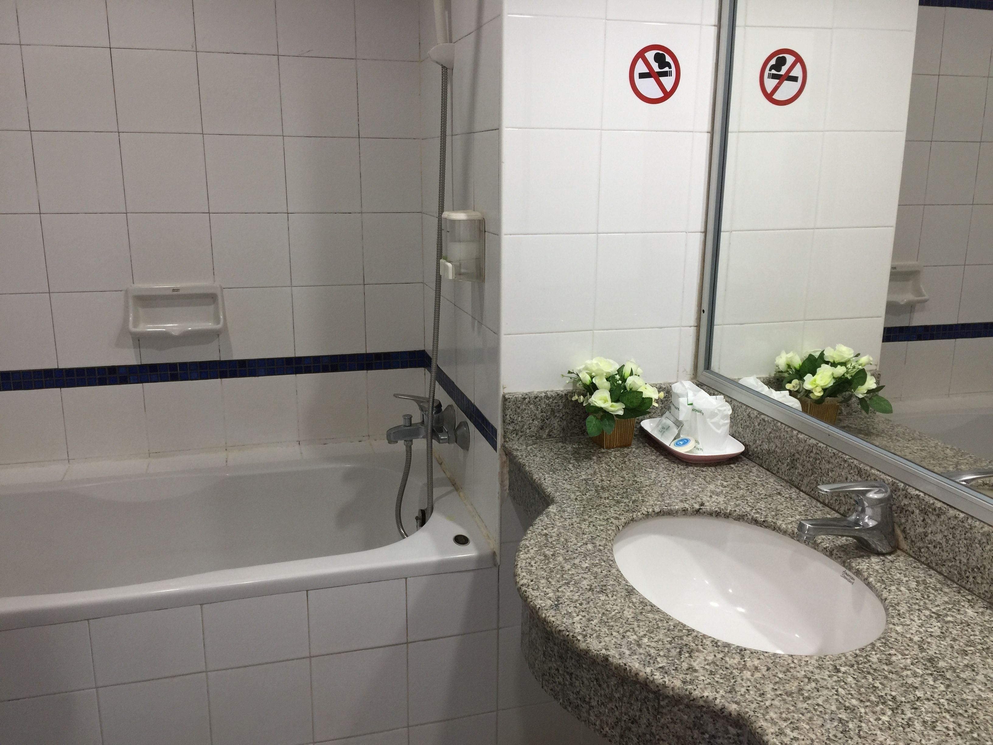 deluxe twin room | bathroom | free toiletries, hair dryer, slippers, towels