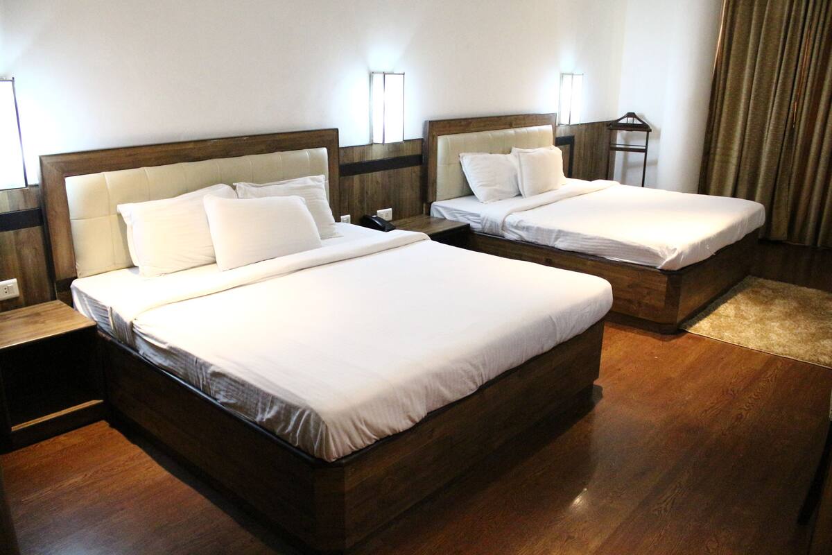 Premium bedding, minibar, iron/ironing board, rollaway beds