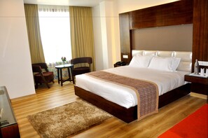 Premium bedding, minibar, iron/ironing board, rollaway beds