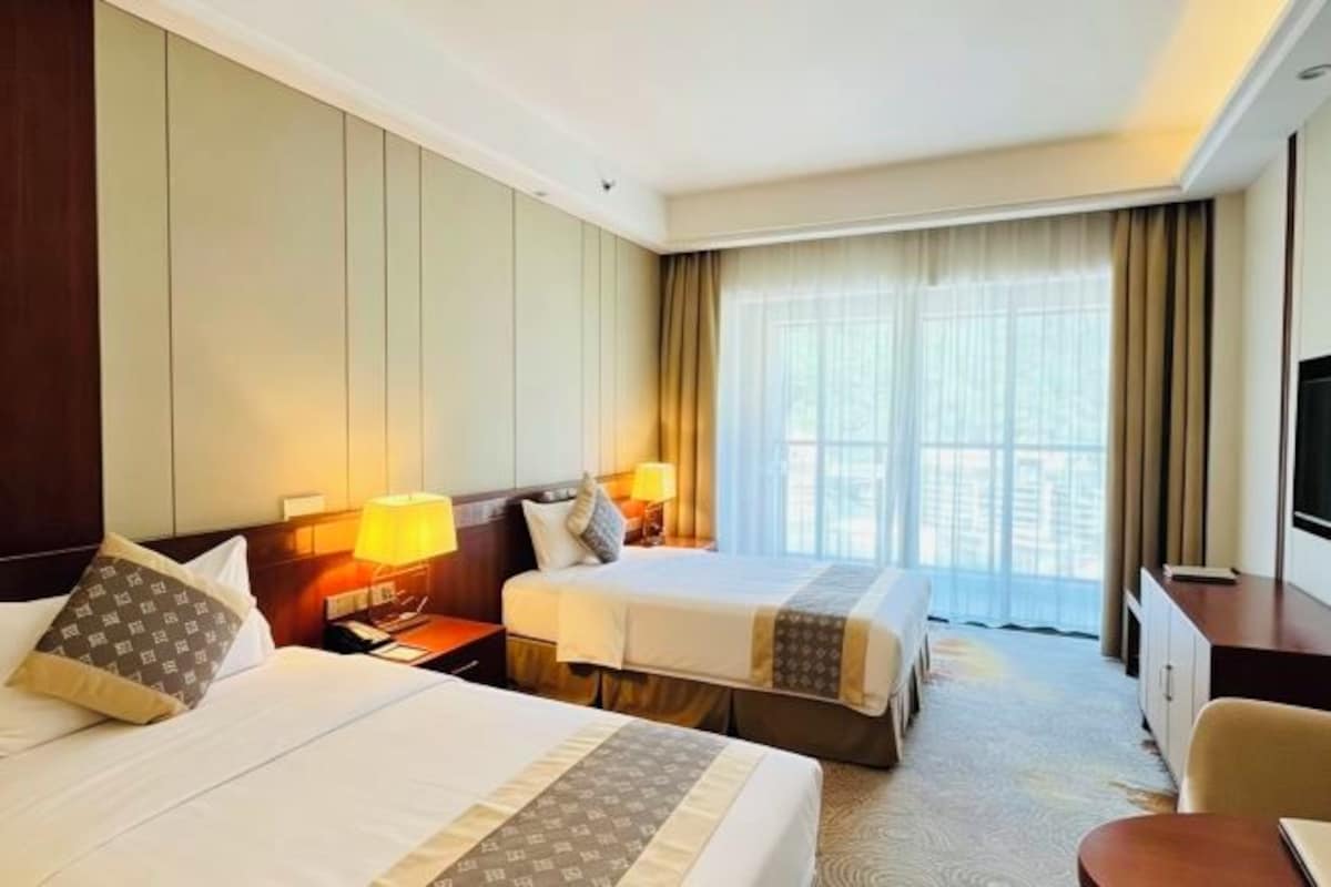 Desk, blackout curtains, iron/ironing board (on request), rollaway beds