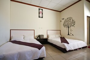 Family Quadruple Room | Blackout drapes, free WiFi, bed sheets