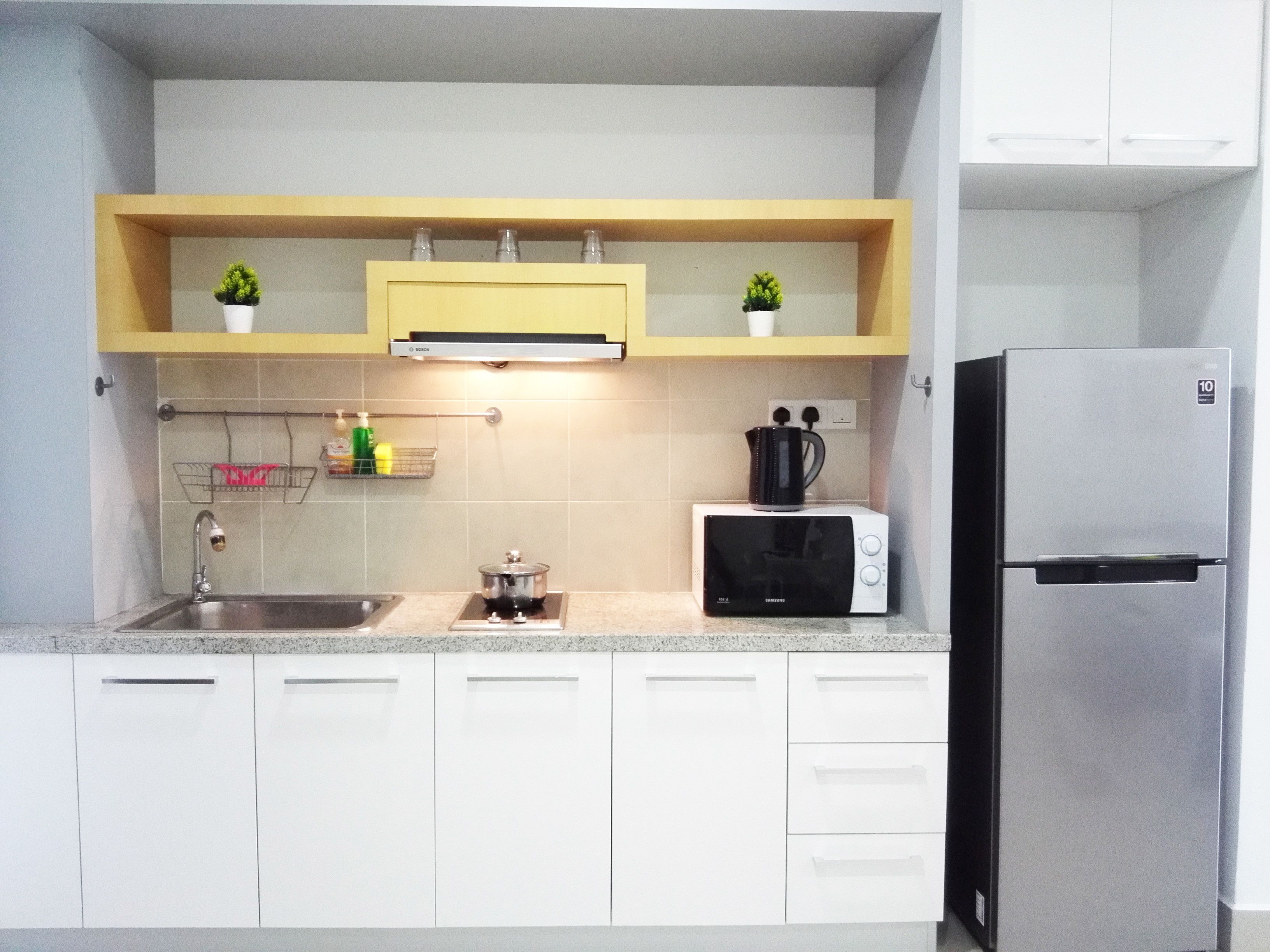 garden feel family room | private kitchen | full-sized fridge, microwave, stovetop, electric kettle