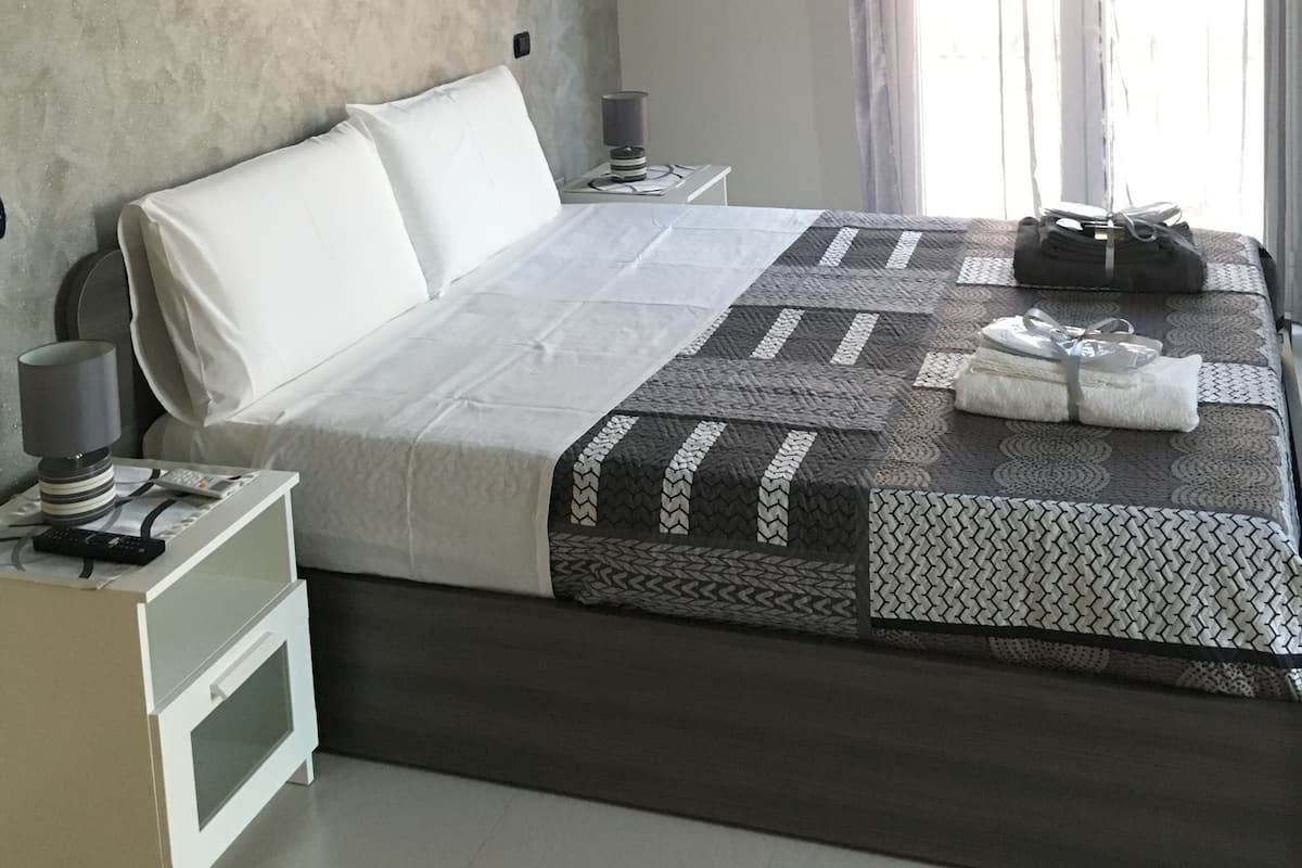 Standard Double Room, Balcony, City View | Minibar, in-room safe, desk, free WiFi