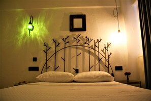 Superior kamer | Luxe beddengoed, een minibar, een kluis op de kamer